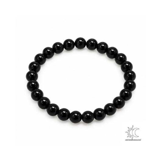 Pulseira elástica de ónix preto com contas redondas polidas de 6 mm sobre fundo branco
